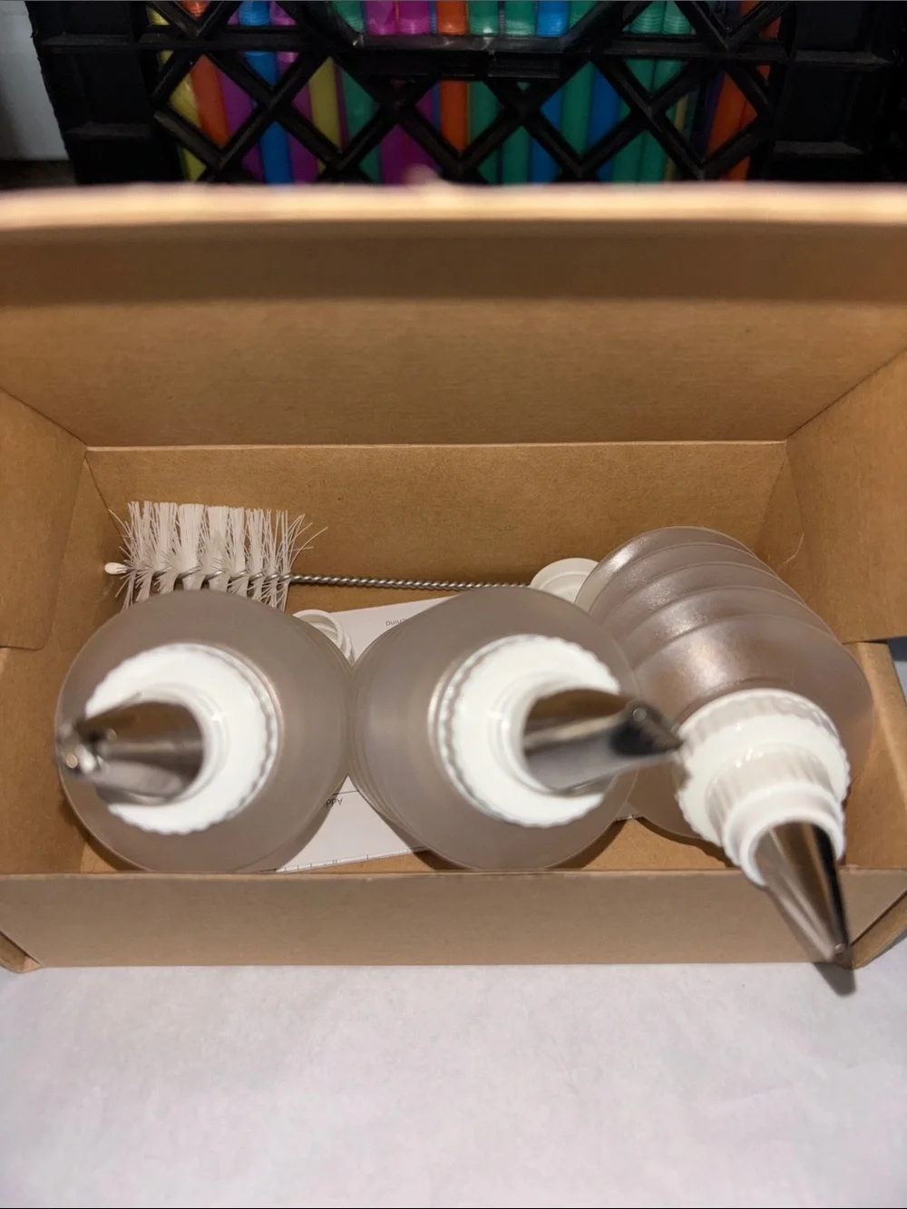 The Pampered Chef Decorator Bottle Set in Brown and Black Packaging